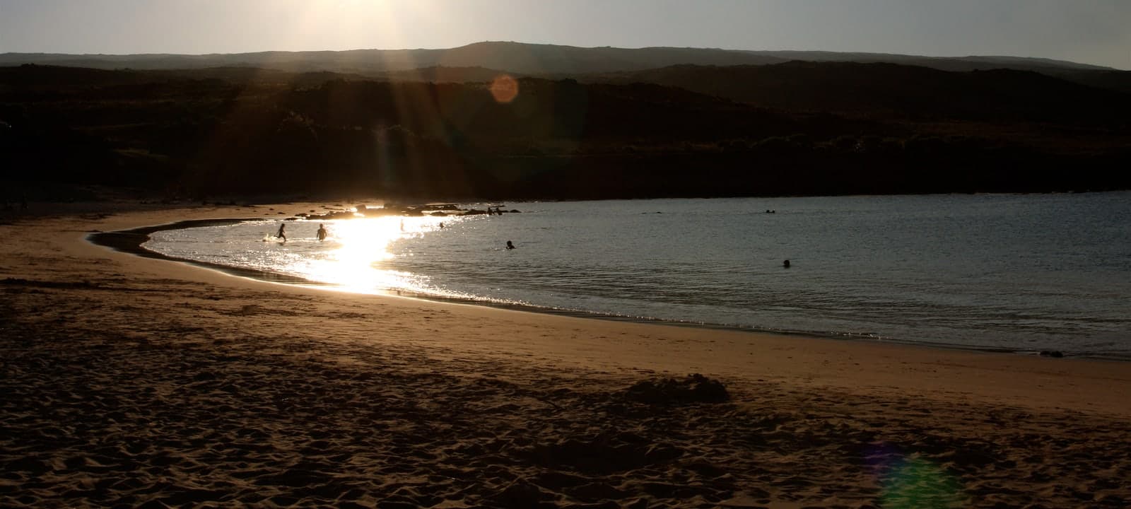 Vintage film projector light in a dark room.
